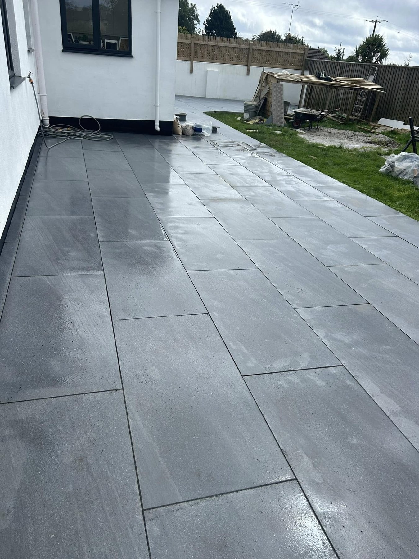 Wet-look porcelain patio laid by R A Groundworks